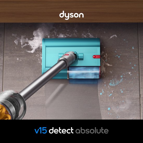 Dyson V15 detect absolute stofzuiger met turquoise opzetstuk die dweilt en schuim verwijdert van tegels.