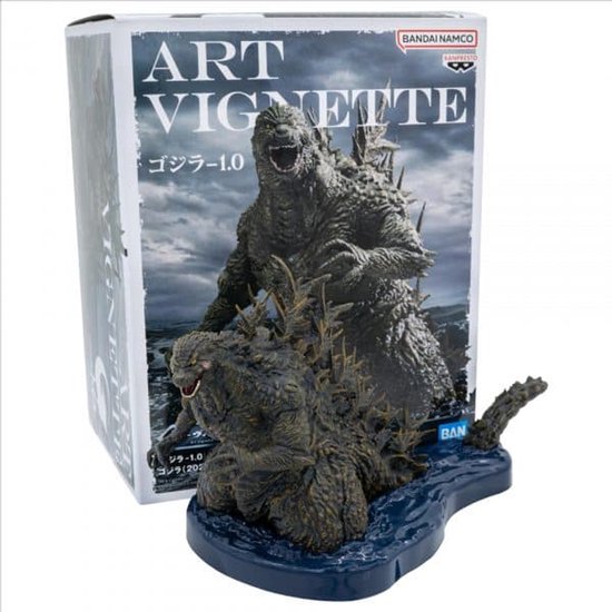 Doos met "ART VIGNETTE Godzilla 1.0", met een figuur van Godzilla op een blauwe waterbasis.