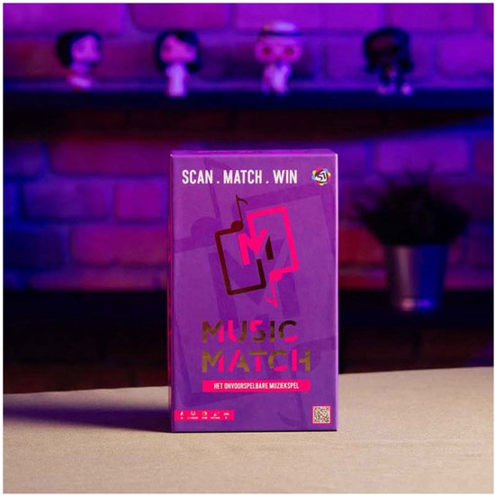 Paarse doos met gouden en roze logo "Music Match" en de tekst "SCAN. MATCH. WIN."