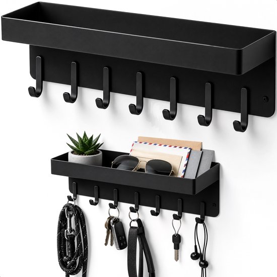 Porte-clés noir avec étagère, six crochets, plante décorative, lunettes de soleil et clés.