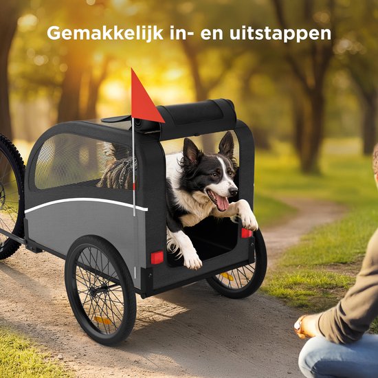 Een hond kijkt uit een fietskar op een bospad. "Gemakkelijk in- en uitstappen" staat in tekst.