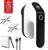 Elektrische pluizenverwijderaar met accessoires: USB-kabels, reserve messen, schoonmaakborstels en opvangbakje. Met 'Best Reviewed' sticker.