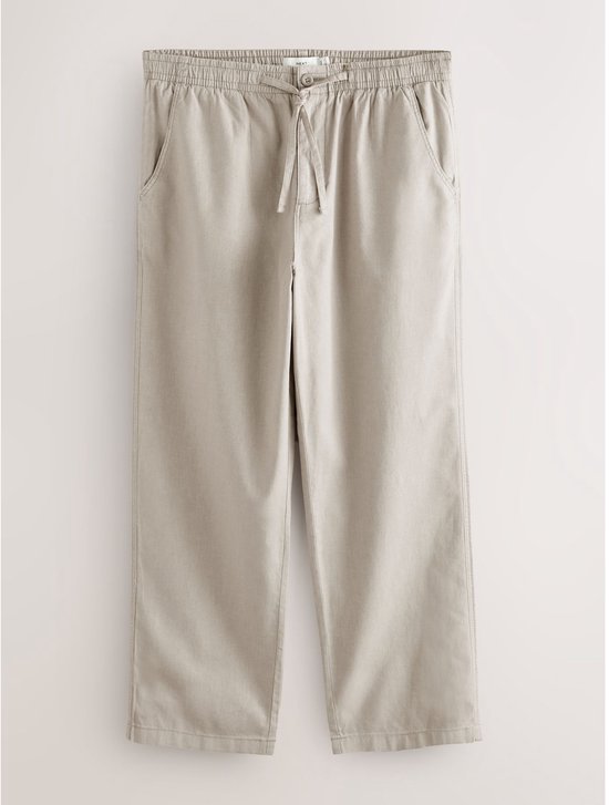 Natuurlijke linnen-katoenen broek met relaxte pasvorm, elastische tailleband en koord.