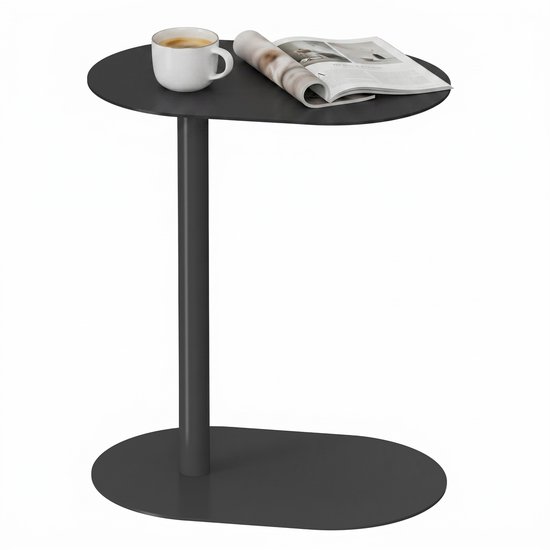 Table d'appoint noire avec une tasse de café et un magazine, sur fond blanc.