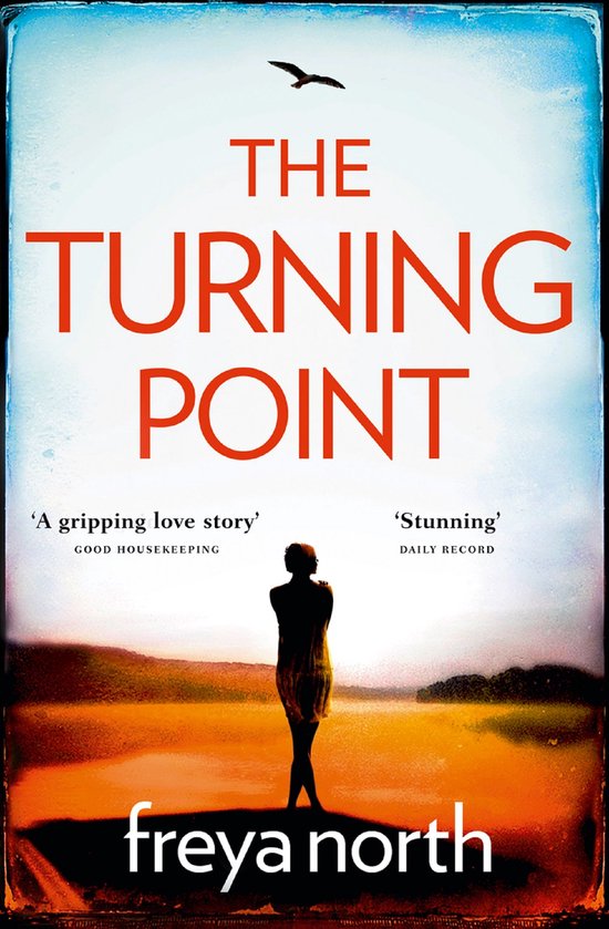 Boek 'The Turning Point' van Freya North. Een vrouw staat op een zandweg, met citaten van Good Housekeeping en Daily Record.