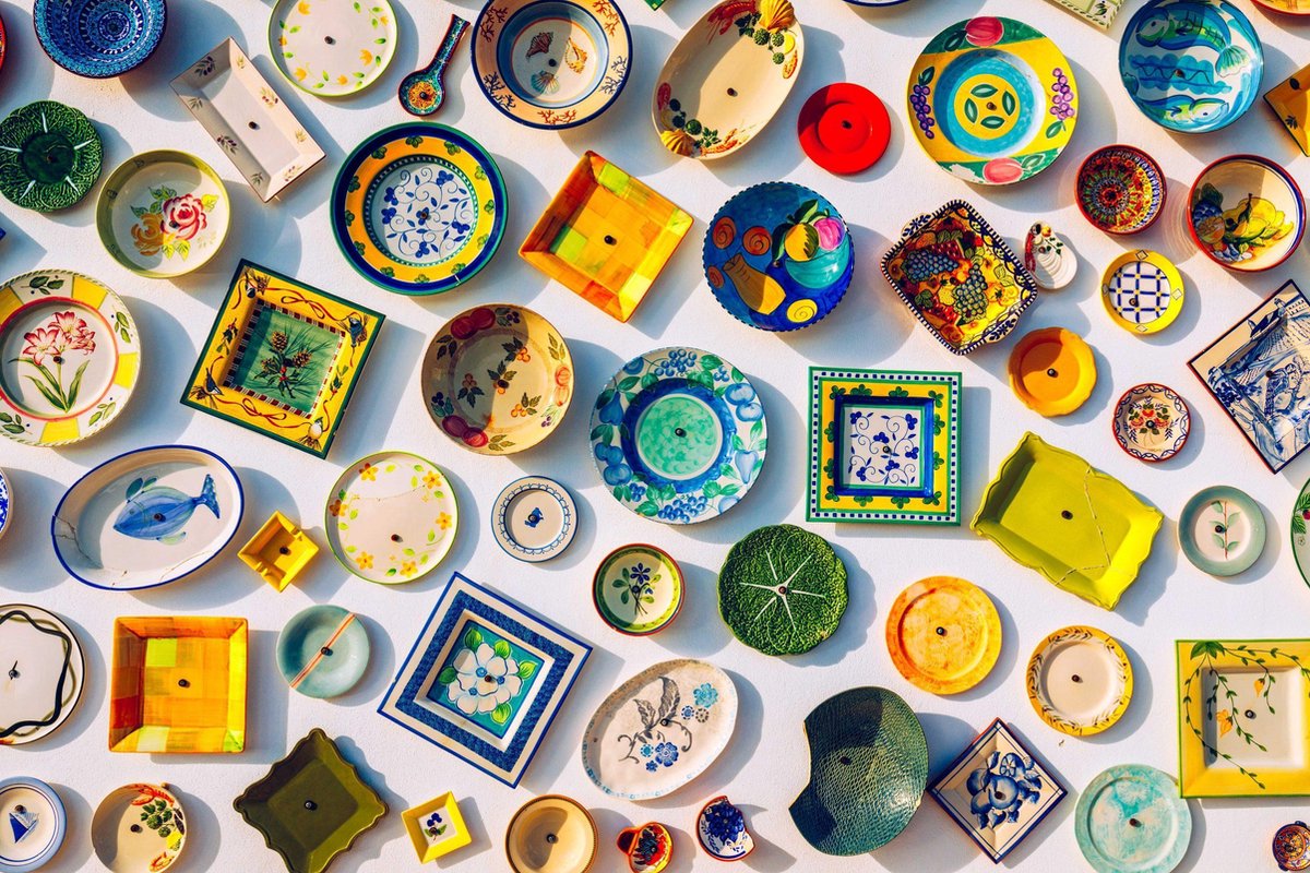 Collection of colorful Portuguese ceramic pottery, local craft products from Portugal....
