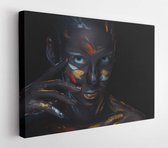 Portrait of a young woman who is posing covered with black paint in the studio on a black background - Modern Art Canvas - Horizontal - 368988482 - 40*30 Horizontal