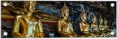 Tuinposter – Rijen Gouden Boeddha's in Wat Tham Khuha Sawan Tempel in Thailand - 60x20 cm Foto op Tuinposter (wanddecoratie voor buiten en binnen)