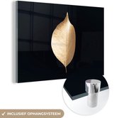 MuchoWow® Glasschilderij 90x60 cm - Schilderij acrylglas - Bladeren - Goud - Zwart - Planten - Luxe - Foto op glas - Schilderijen