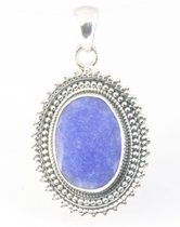 Pendentif artisanal en argent avec saphir bleu