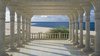 Fotobehang - Vlies Behang - 3D Uitzicht op het Strand en Zee vanaf het Terras met Pilaren - 208 x 146 cm