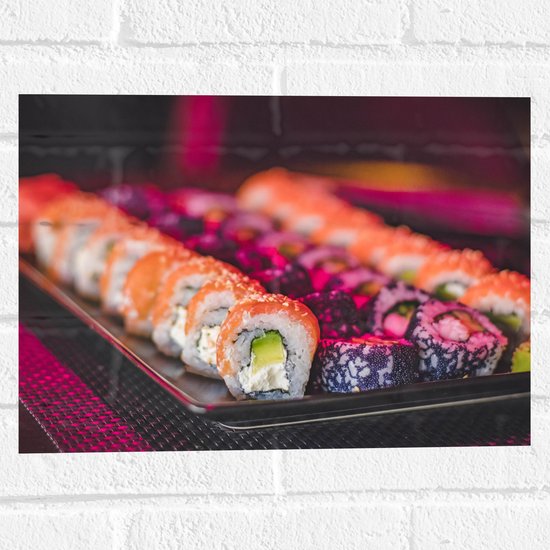Muursticker - Schaal Vol met Verschillende Smaken Sushi in Paars Licht - 40x30 cm Foto op Muursticker