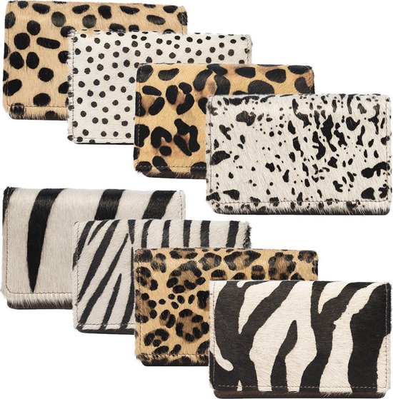 Collectie portemonnees met verschillende dierenprints: luipaard, dalmatiër en zebra.
