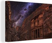 Canvas Schilderij Stad Petra in Jordanie bij donker - 90x60 cm - Wanddecoratie
