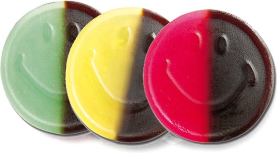 Drie ronde snoepjes met lachende gezichtjes in groen/zwart, geel/zwart en rood/zwart.