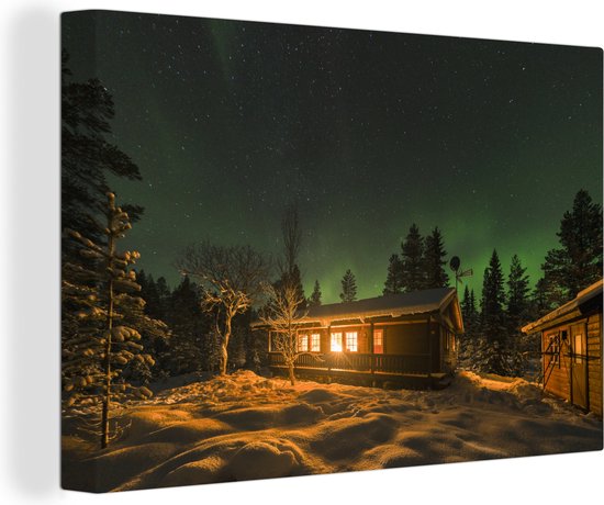 Les aurores boréales au-dessus d'une cabane en rondins dans la neige 120x80 cm - Tirage photo sur toile (Décoration murale salon / chambre)