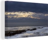 Canvas Schilderij De zee tijdens zonsondergang bij Westkapelle in Zeeland, Nederland - 30x20 cm - Wanddecoratie