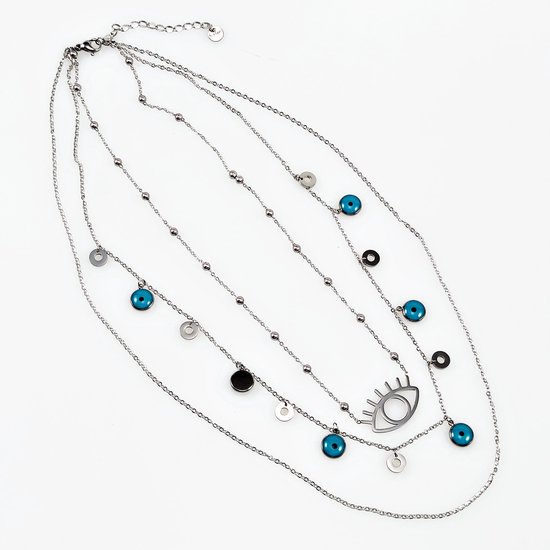 Zilverkleurige ketting met meerdere lagen, oogbedel en blauwe en zwarte kraaltjes.