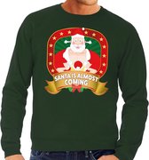 Foute kersttrui / sweater voor heren Santa Is Almost Coming - groen - Kerstman met dame XXL