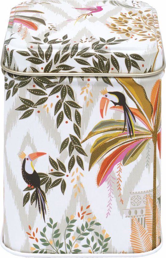 Boîte carrée avec un imprimé tropical de palmiers, de feuilles et de toucans aux couleurs vives sur fond blanc cassé avec un motif en zigzag.