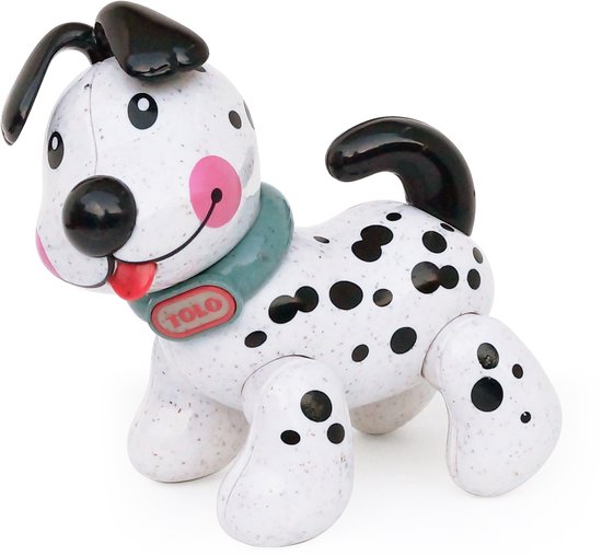 Wit speelgoedhondje met zwarte spikkels, zwarte oren en staart, rode tong, roze blosjes.