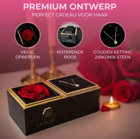 Zwarte juwelendoos met gouden rand, een rode roos in het linker vak en een gouden ketting met zirkonia steen in het rechter vak.