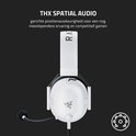 Witte gaming headset met zwarte hoofdband, deels van bovenaf gezien.