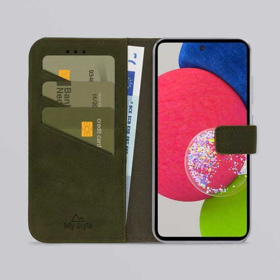 Étui téléphone vert foncé ouvert avec téléphone, fentes pour cartes de crédit et un billet.