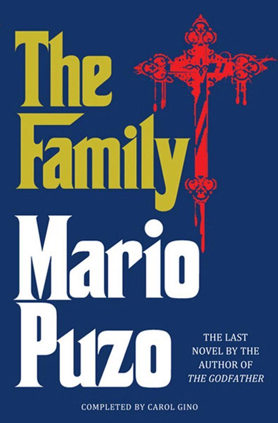 Livre 'The Family' de Mario Puzo, avec une croix rouge décorée sur fond bleu. Le texte 'The Family Mario Puzo' est en lettres jaunes et blanches.