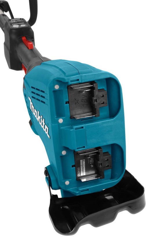 Close-up van de turquoise Makita combisysteem body met twee batterij-ingangen en het logo.