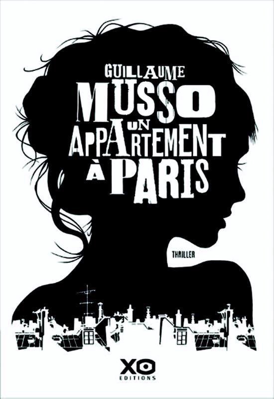 Silhouette d'une femme avec le titre "Un appartement à Paris" et "Guillaume Musso"