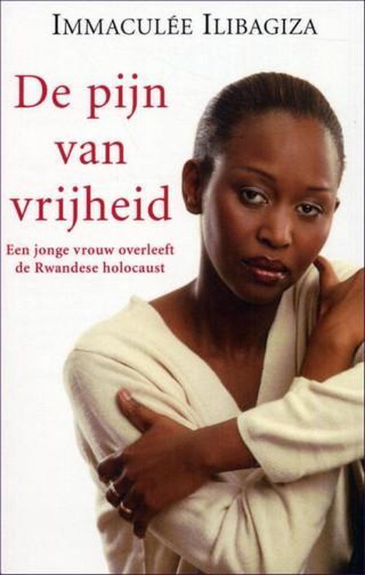 Een jonge vrouw met een beige blouse, de tekst 'De pijn van vrijheid' staat op de voorkant.