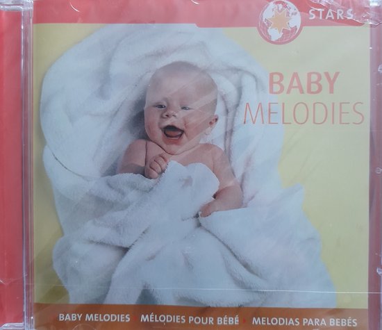 Lachende baby gewikkeld in een witte handdoek, met tekst 'Baby Melodies'.