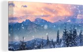 Canvas Schilderij Sneeuw - Lucht - Bos - Winter - 40x20 cm - Wanddecoratie