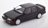 Het 1:18 Diecast model van de Ford Sierra Cosworth van 1988 in Black. De fabrikant van het schaalmodel is MCG. Dit model is alleen online beschikbaar.