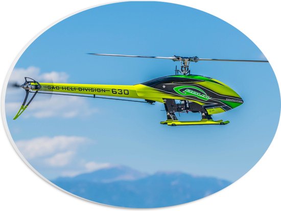 WallClassics - PVC Schuimplaat Ovaal - Geel Groene Helikopter bij Wolken - 28x21 cm Foto op Ovaal  (Met Ophangsysteem)