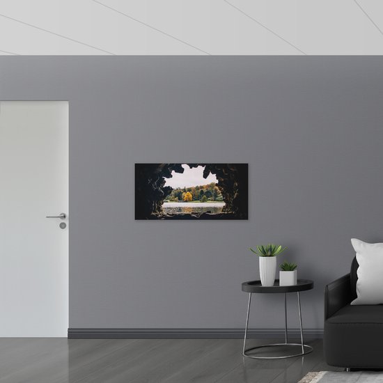 PVC Schuimplaat- Uitzicht over Meer vanuit een Grot - 100x50 cm Foto op PVC Schuimplaat