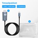 Complete set met een USB-C naar HDMI kabel en verpakking. De kabel is zilver met een 4K UHD logo en is opgerold.