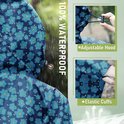 100% waterdichte blauwe poncho met bloemenprint, capuchon en elastische manchetten, met regeneffect.