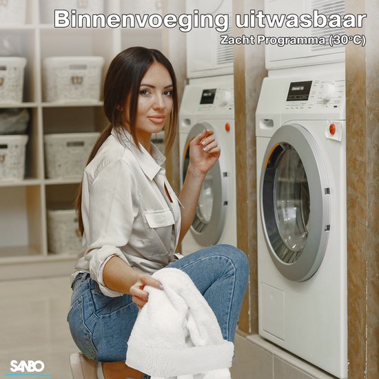 Vrouw met een witte handdoek naast een wasmachine. De tekst geeft aan dat de binnenvoering wasbaar is op 30°C.
