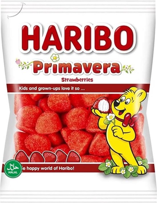 Haribo Primavera zak met helderrode aardbeienvormige snoepjes. Een gele beer met een bloem en gras sieren de witte verpakking.