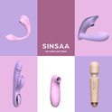 Collage van verschillende roze en paarse vibrators, waaronder een zwarte wand vibrator.