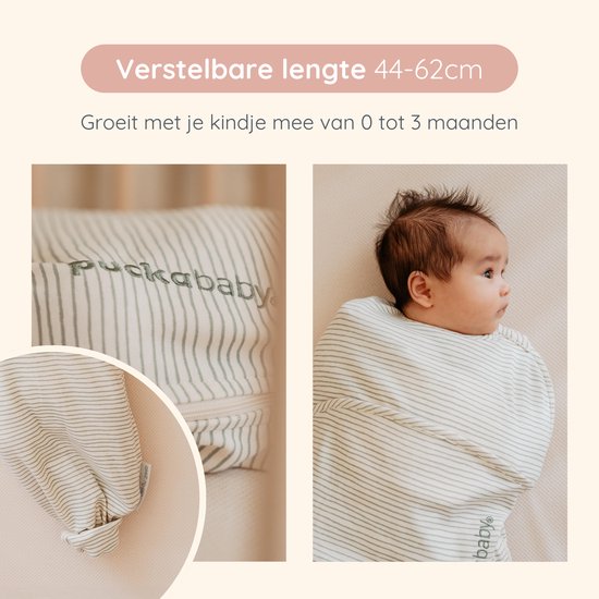 Close-up van groen gestreept Puckababy slaapzakje, met rits. Baby in groen gestreept slaapzakje.