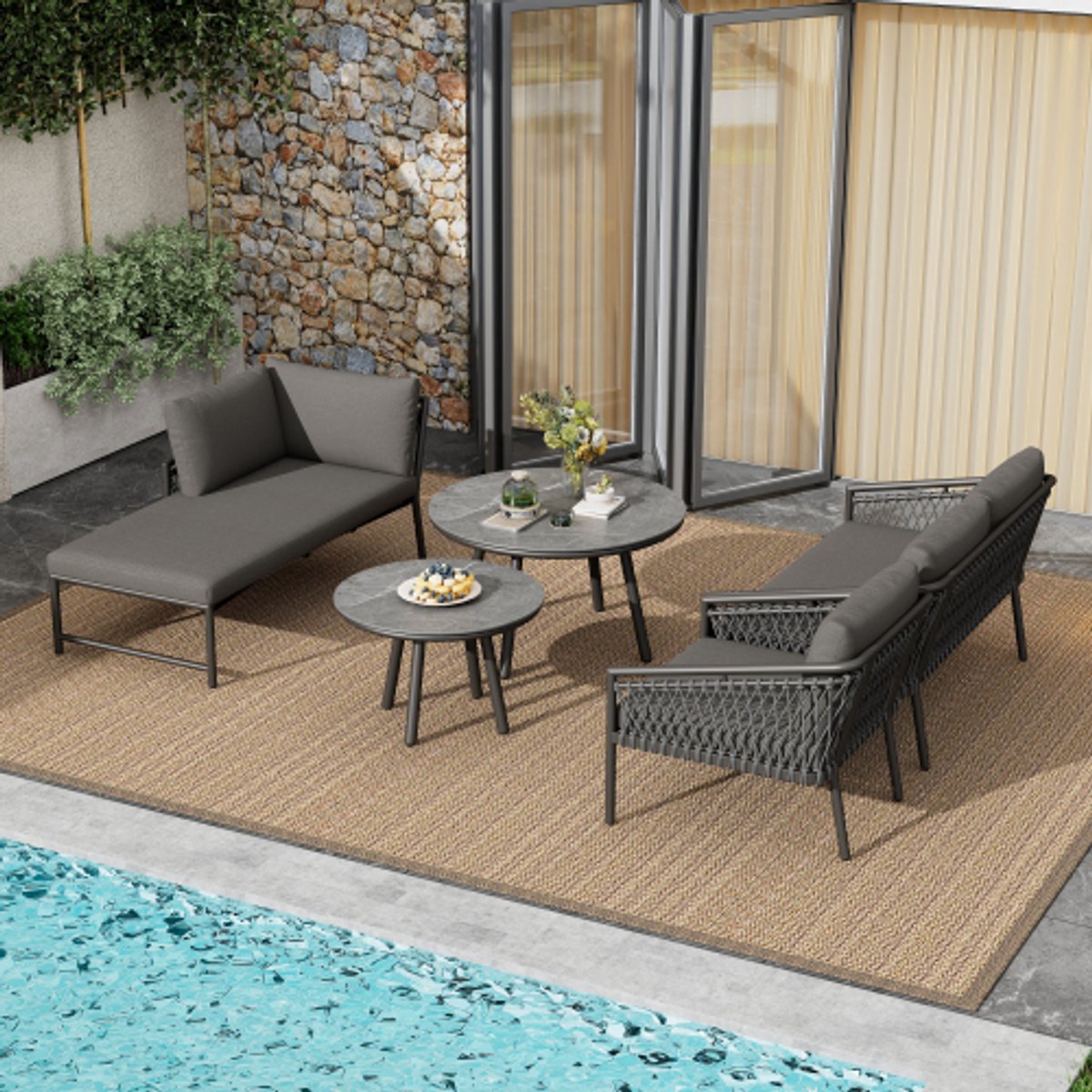 Handgeweven grijze touw tuin loungeset met kussens voor balkon en terras.
