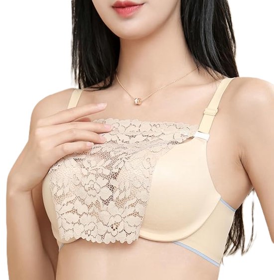 Beige kanten décolleté bedekker met bloempatroon, gedragen over een beige beha.