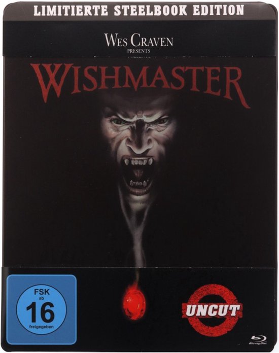 Voorzijde Steelbook editie Wishmaster met demonengezicht en rode gloed.