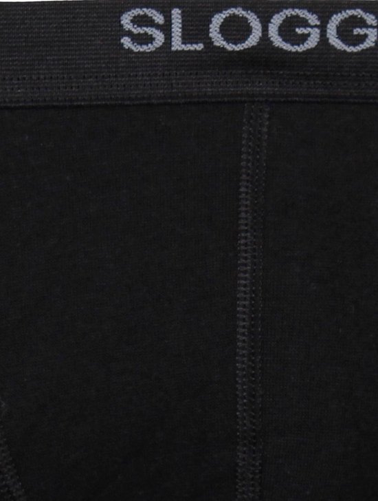 Detail van de tailleband en naden van een zwarte Sloggi Basic short.