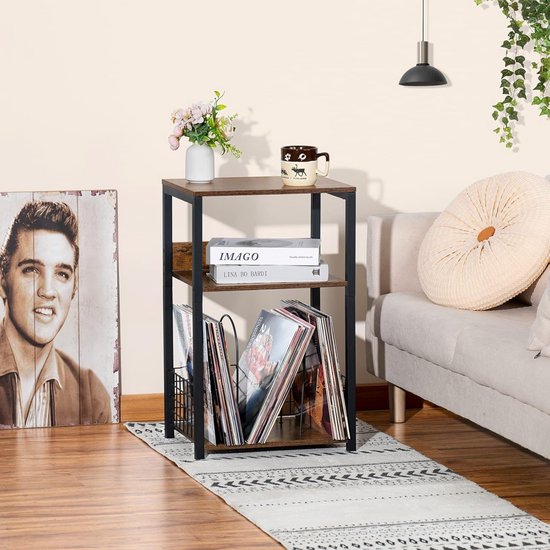Bruin en zwart 3-laags opbergsysteem naast een bank, met platenspeler, boeken en LP's.