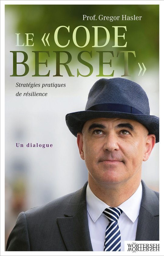 Boekomslag met Prof. Gregor Hasler die een blauwe hoed en een gestreept. 'Le "Code Berset": Stratégies pratiques de résilience. Un dialogue' staat op de cover.