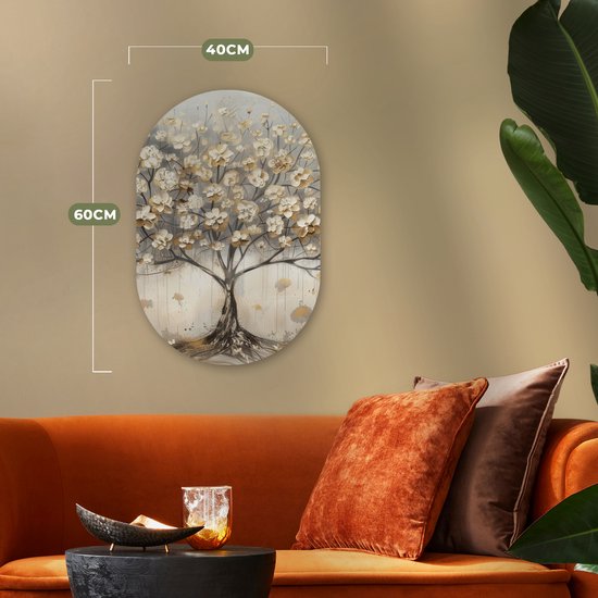 Ovaal kunstwerk van 40x60 cm met een beige, gouden en grijze boom, boven een oranje bank.